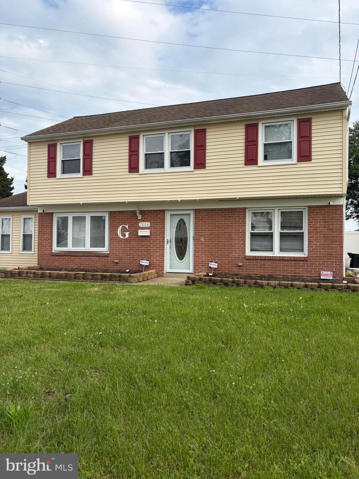 7404 Wyndam Road Pennsauken, NJ 08110 - Photo 4 of 50 a front view of house with yard and front view of a house