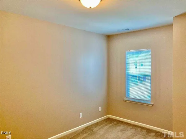 a view of a room with a window