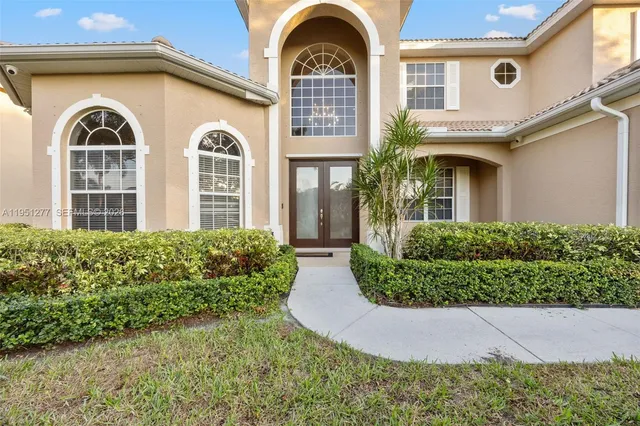 a view of a house with a garden