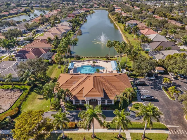 an aerial view of a house with a garden