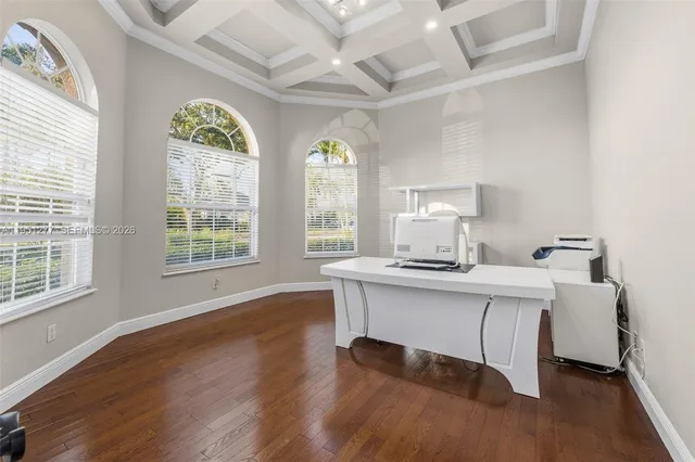 a view of a sink and a window in a room
