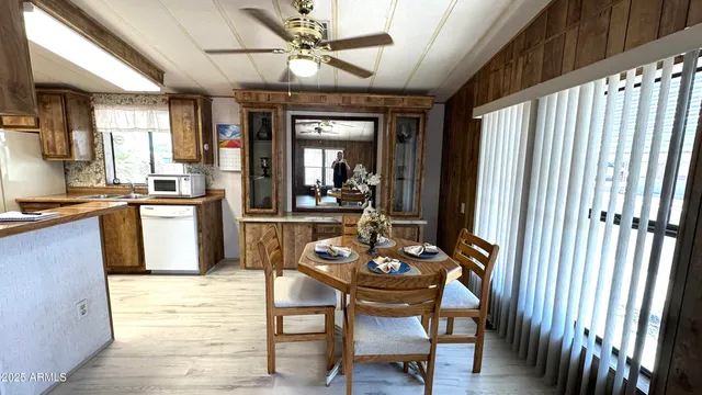 a kitchen with stainless steel appliances granite countertop a stove and a refrigerator