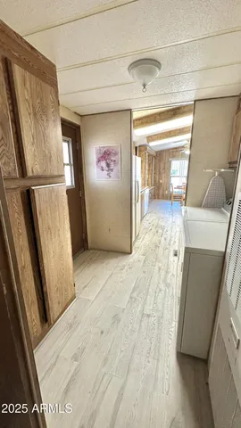 a spacious bedroom with a bed and furniture