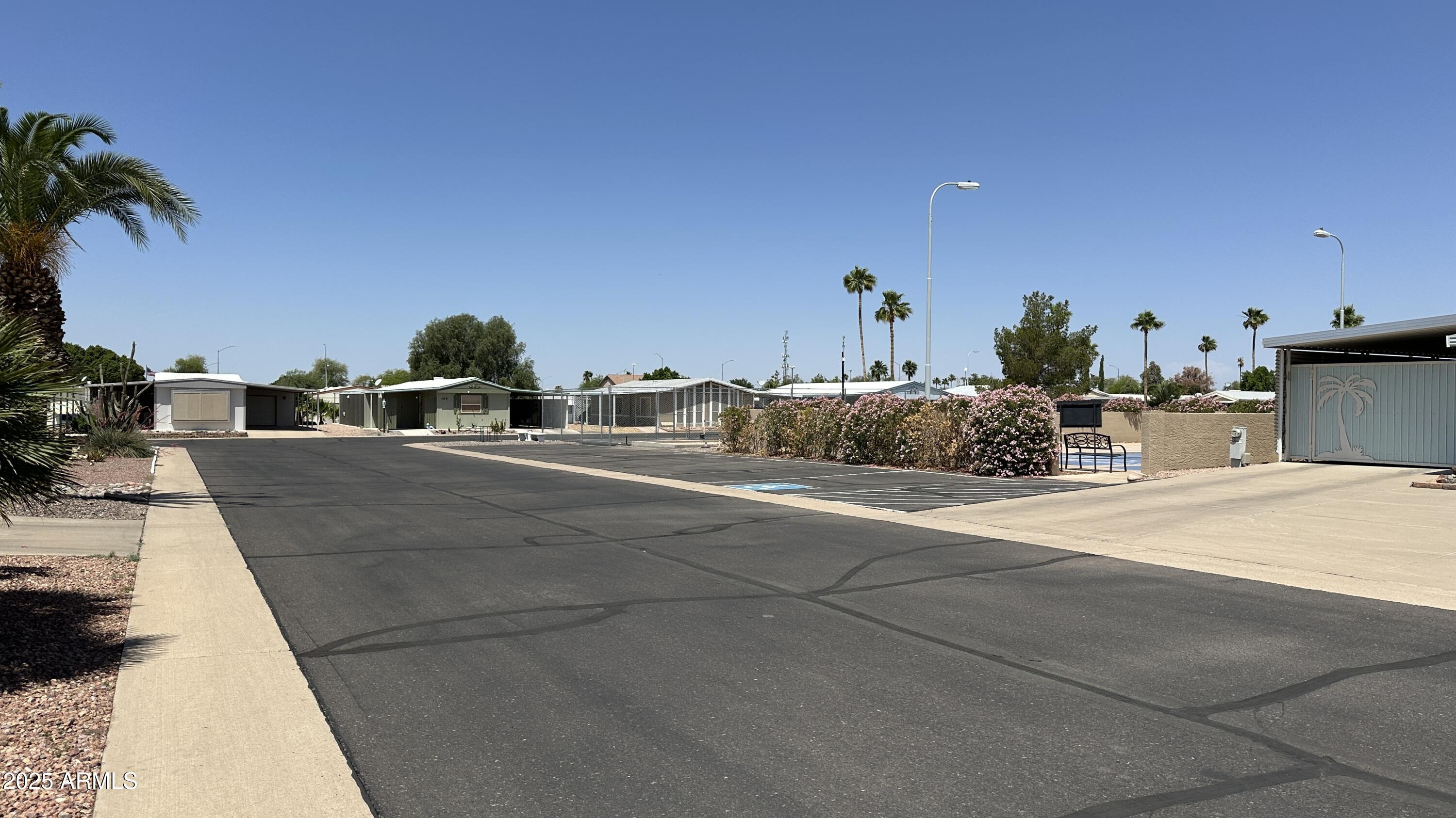 834 South Meridian Road, Unit 124 Apache Junction, AZ 85120 - Photo 4 of 28 a view of a city from a terrace
