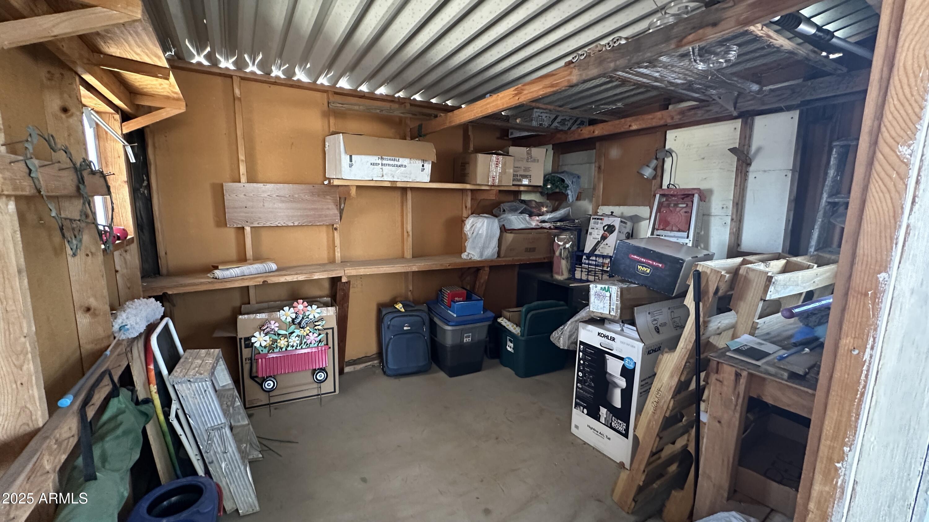 834 South Meridian Road, Unit 124 Apache Junction, AZ 85120 - Photo 8 of 28 a storage room with washer and dryer