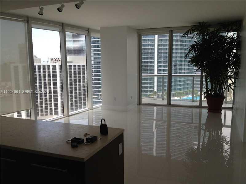 475 Brickell Avenue, Unit 2415 Miami, FL 33131 - Photo 2 of 9 a view of a room that has a window