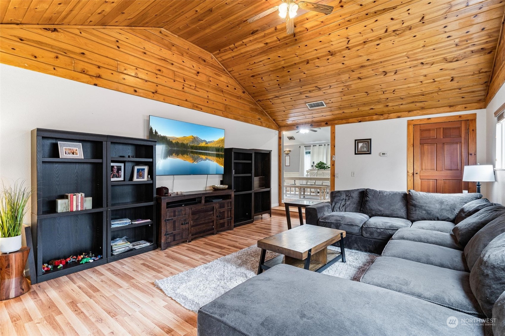 17821 Trombley Road Snohomish, WA 98290 - Photo 13 of 36 a living room with furniture and a flat screen tv