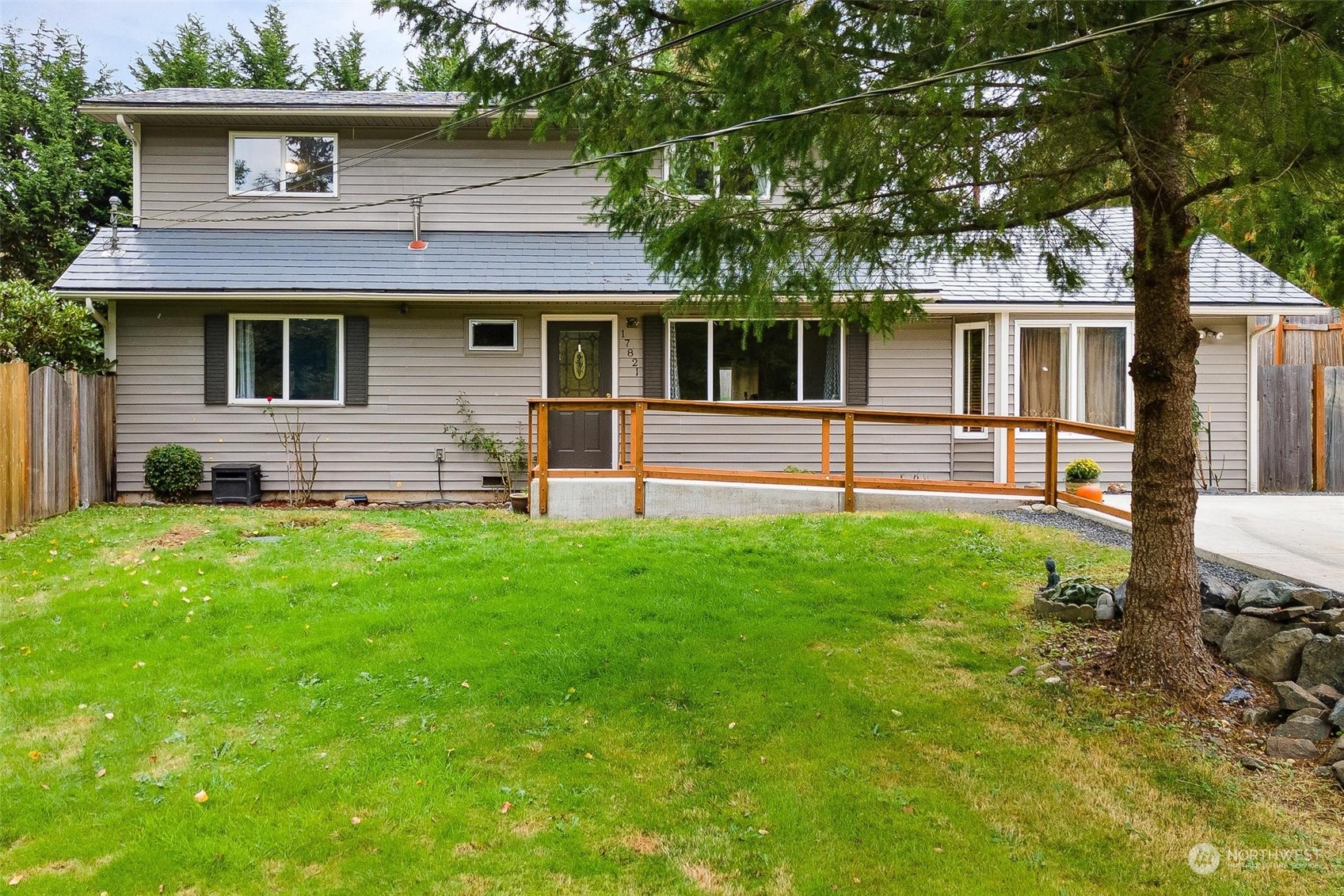 17821 Trombley Road Snohomish, WA 98290 - Photo 2 of 36 a front view of a house with a yard