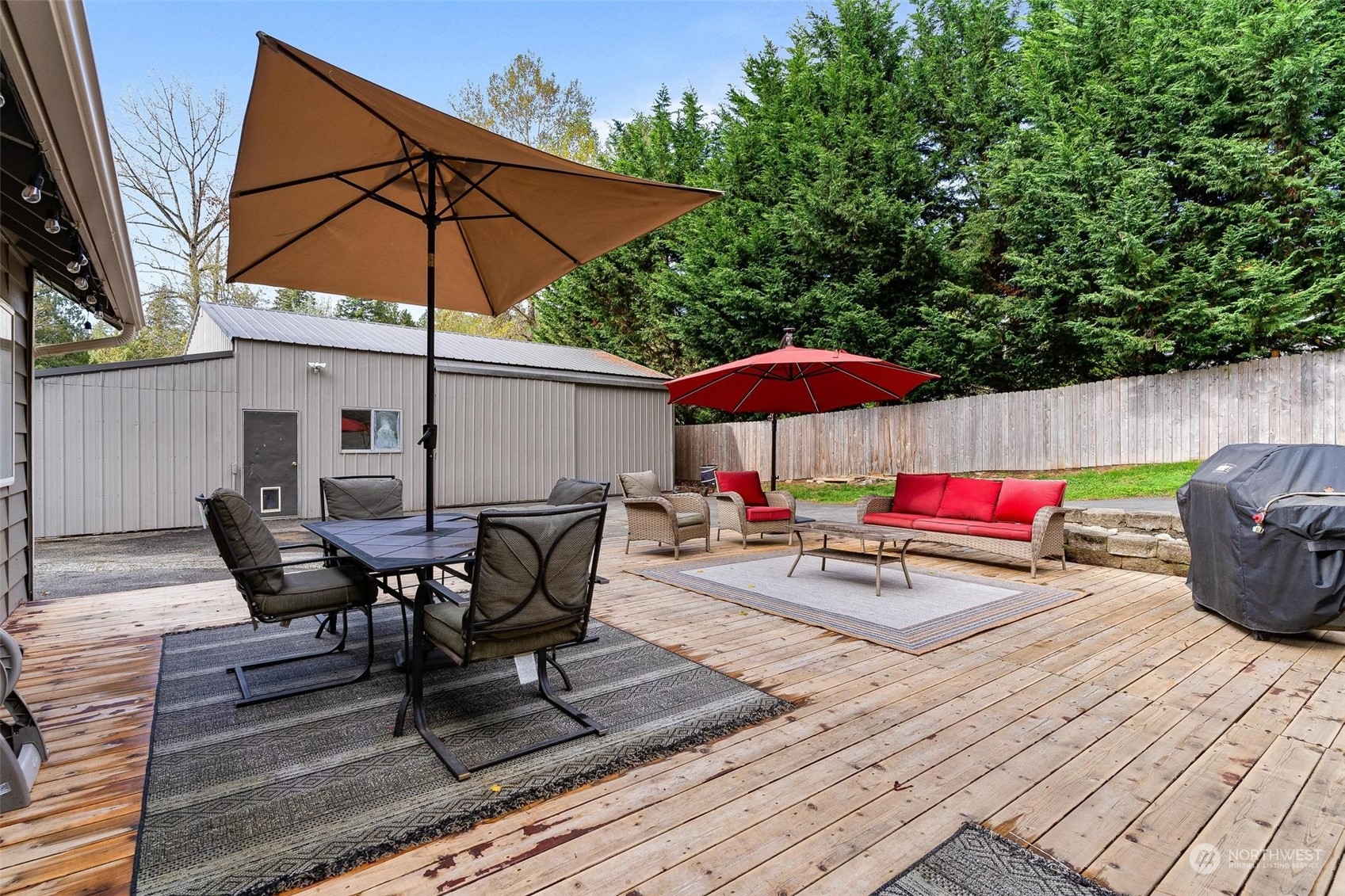17821 Trombley Road Snohomish, WA 98290 - Photo 28 of 36 an outdoor space with furniture and umbrella
