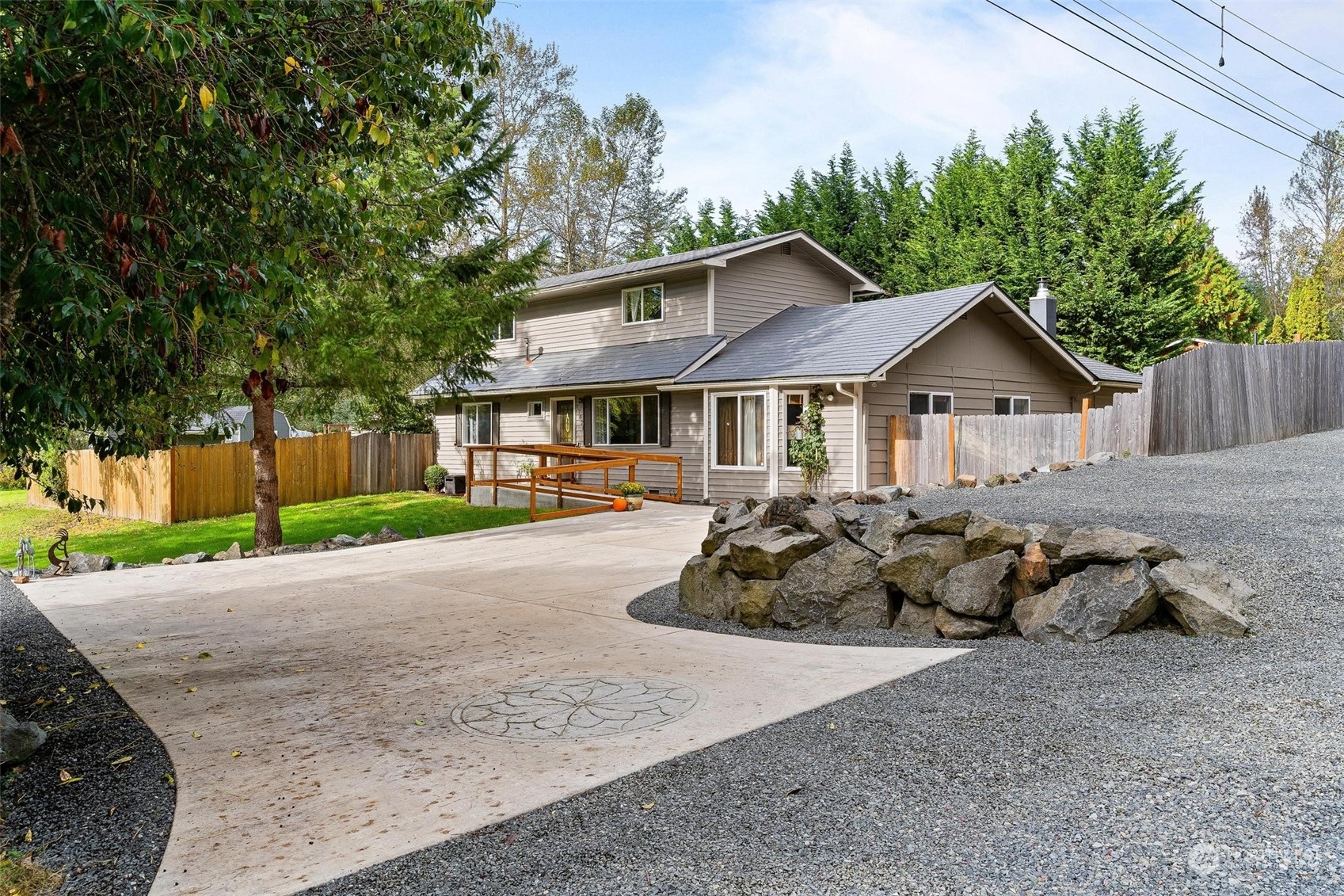 17821 Trombley Road Snohomish, WA 98290 - Photo 35 of 36 a front view of a house with a garden