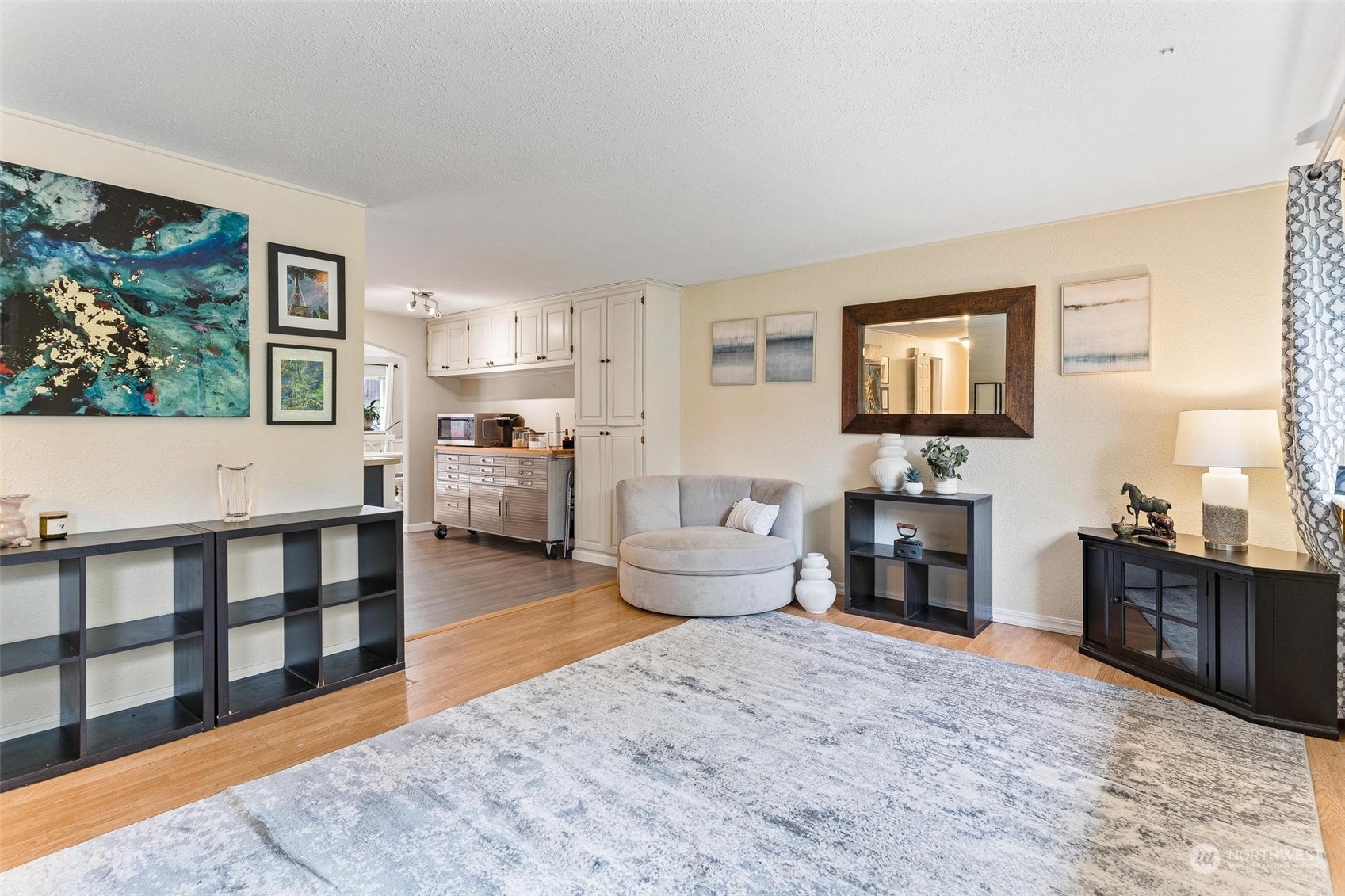 17821 Trombley Road Snohomish, WA 98290 - Photo 7 of 36 a living room with furniture a flat screen tv and a fireplace