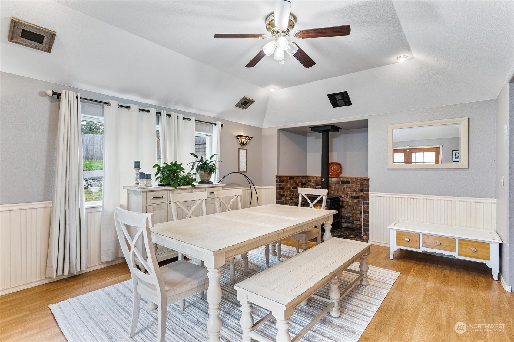 17821 Trombley Road Snohomish, WA 98290 - Photo 9 of 36 a view of a dining room with furniture and wooden floor