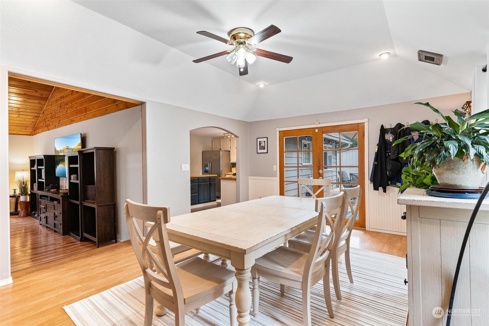 17821 Trombley Road Snohomish, WA 98290 - Photo 10 of 36 a view of a dining room with furniture and wooden floor