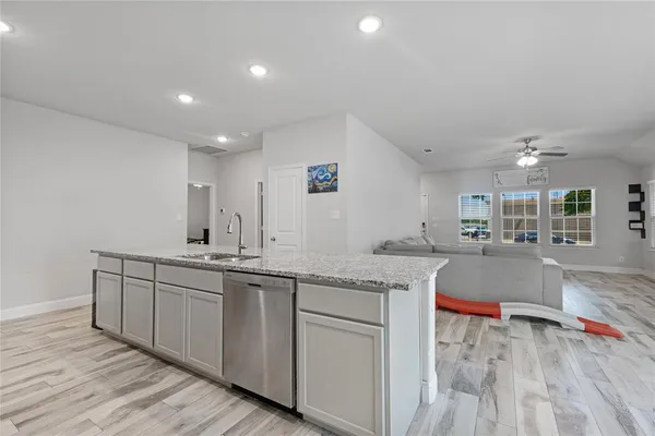 a bedroom with double bed and a flat tv screen