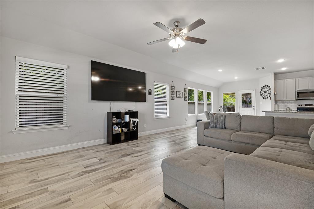 9221 White Settlement Road White Settlement, TX 76108 - Photo 9 of 30 a living room with furniture and a flat screen tv