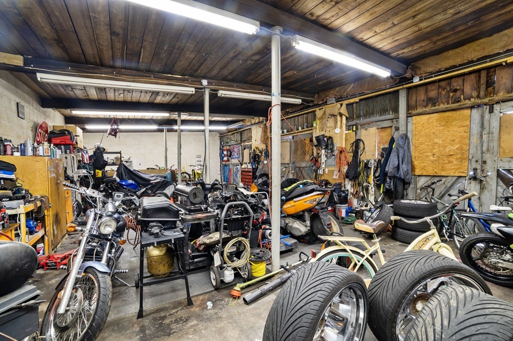 16 Barclay Street Worcester, MA 01604 - Photo 20 of 20 a view of a storage room with washer and dryer