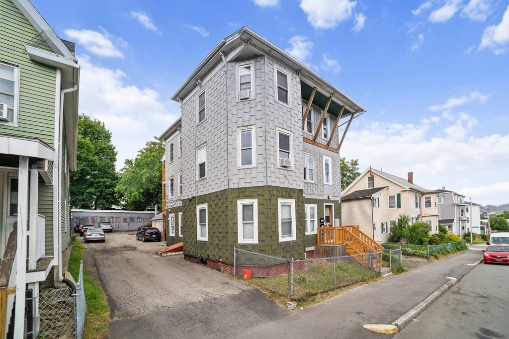 16 Barclay Street Worcester, MA 01604 - Photo 2 of 20 a front view of a house with a yard