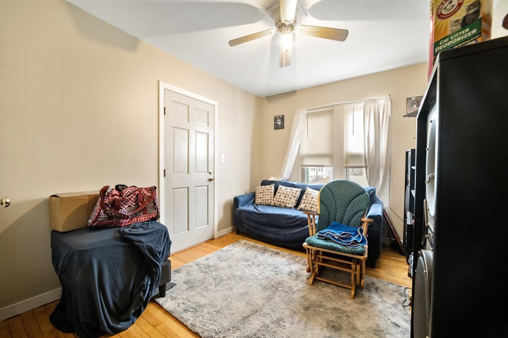 16 Barclay Street Worcester, MA 01604 - Photo 7 of 20 a living room with furniture and a window
