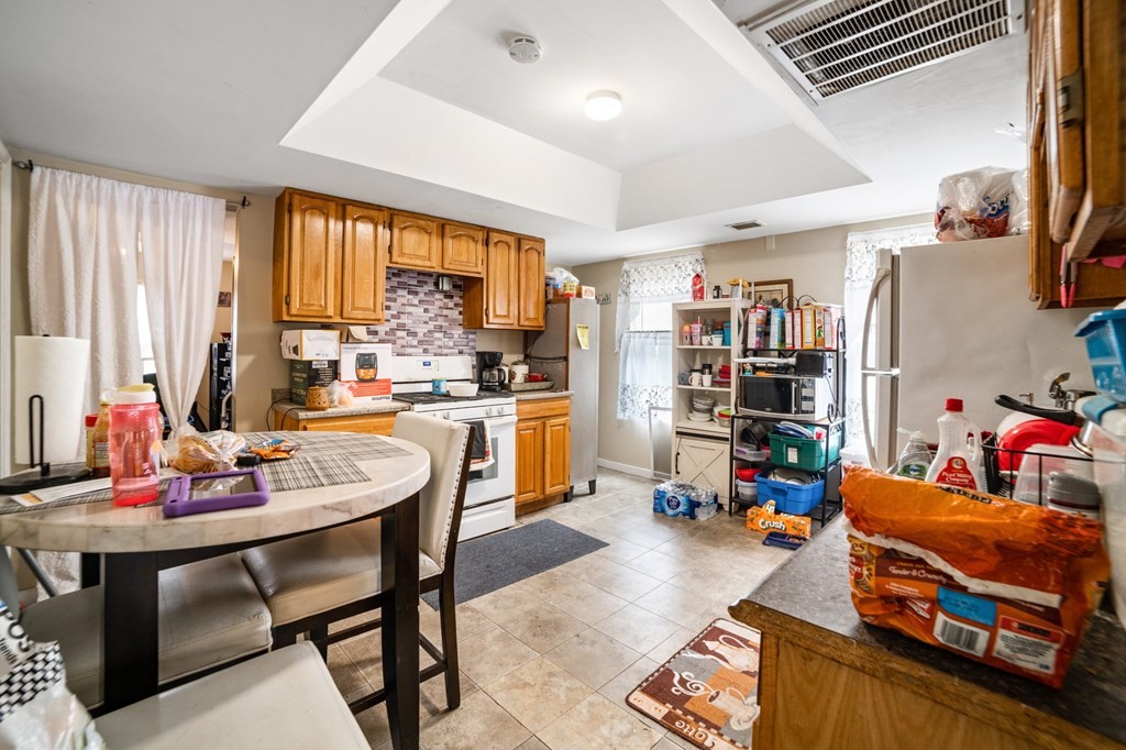 16 Barclay Street Worcester, MA 01604 - Photo 8 of 20 a living room with furniture and a large window