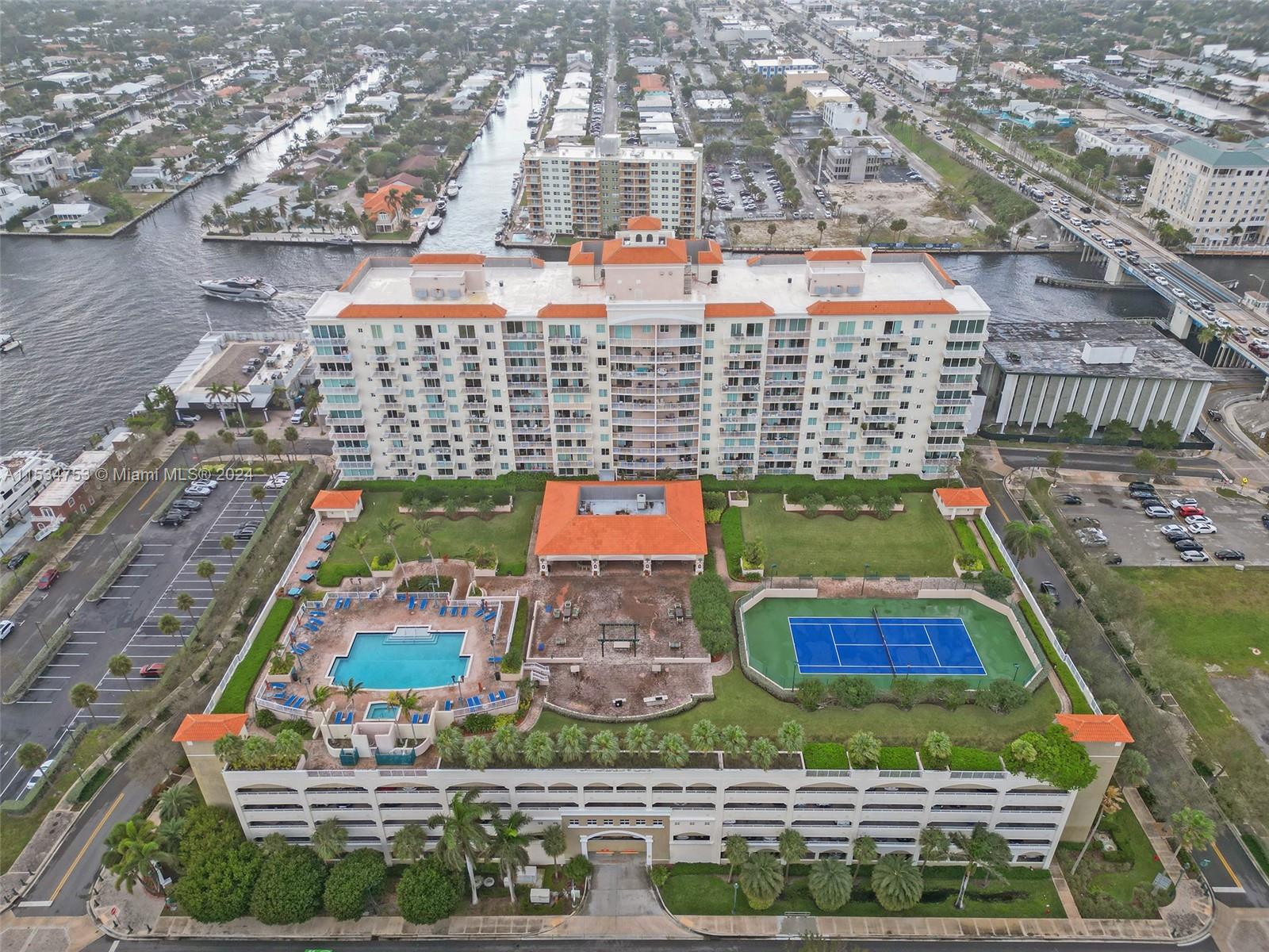 an aerial view of swimming pool and yard