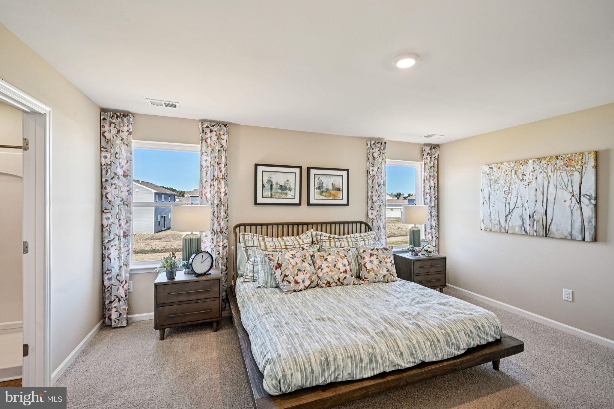 1153 Wintermead Loop Salisbury, MD 21801 - Photo 29 of 33 a bedroom with a bed and window