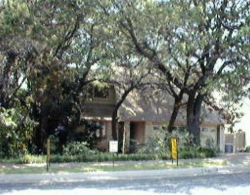 7104 Bill Hughes Road Austin, TX 78745 - Photo 1 of 1 a front view of a house with a yard