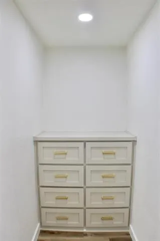a view of an empty walk in closet