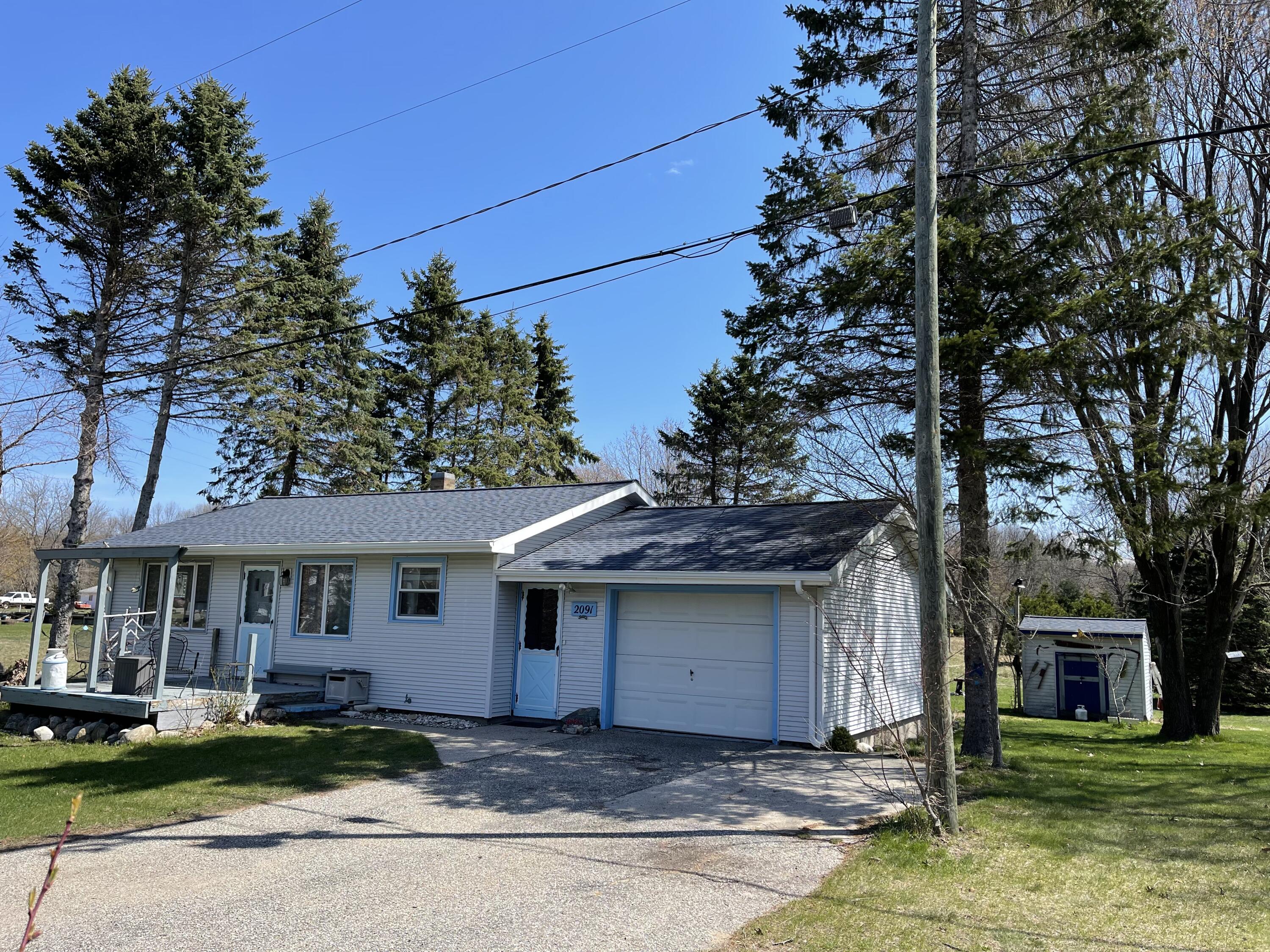 2091 Hill Road Manistee, MI 49660 - Photo 2 of 37 Front of Home