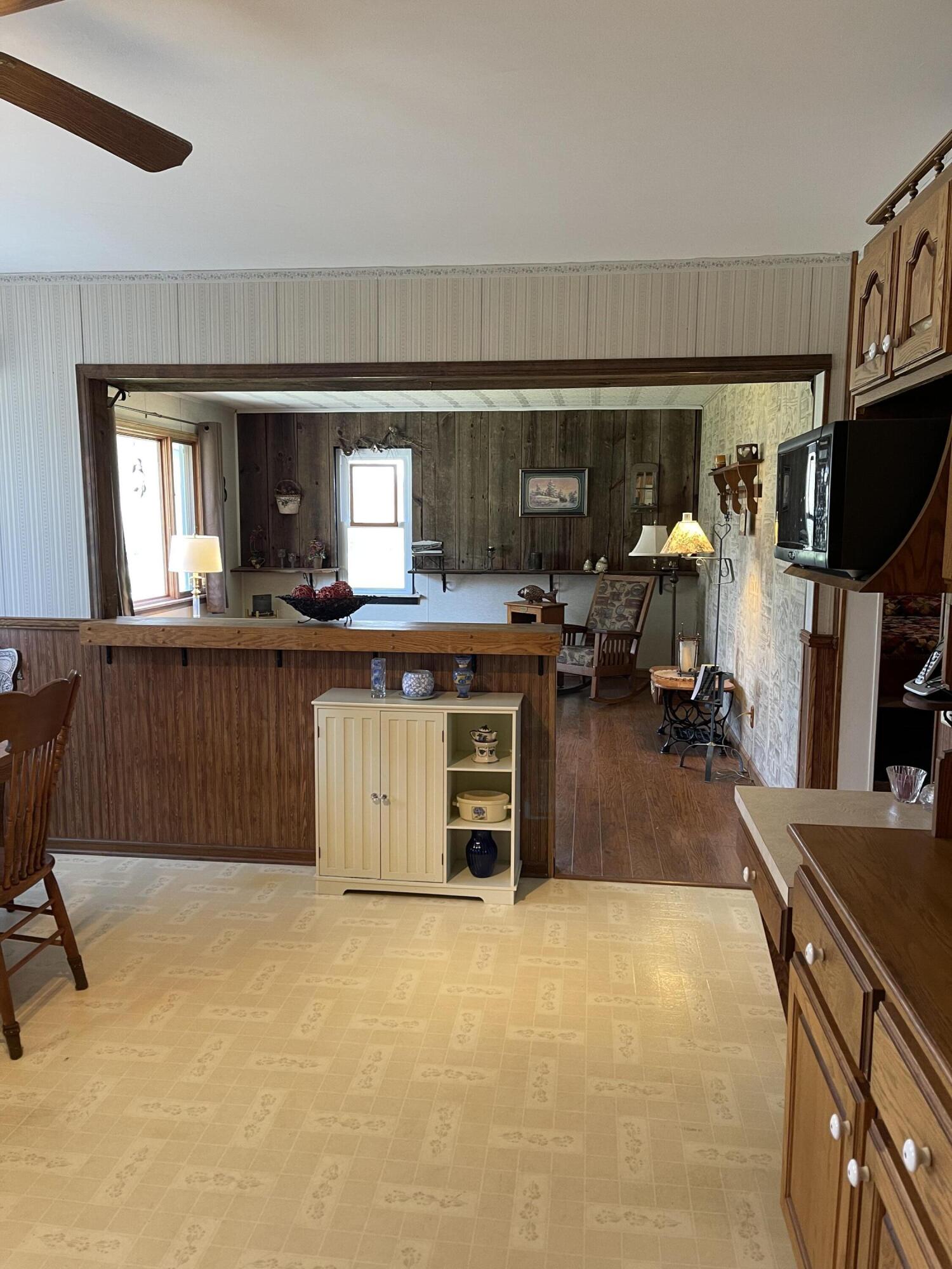 2091 Hill Road Manistee, MI 49660 - Photo 7 of 37 Kitchen to Living Room