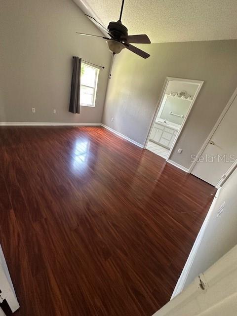 57 St Kitts Circle Winter Haven, FL 33884 - Photo 6 of 11 a view of an empty room with window and wooden floor