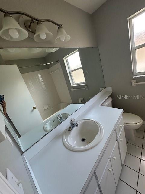 57 St Kitts Circle Winter Haven, FL 33884 - Photo 9 of 11 a bathroom with a sink and toilet