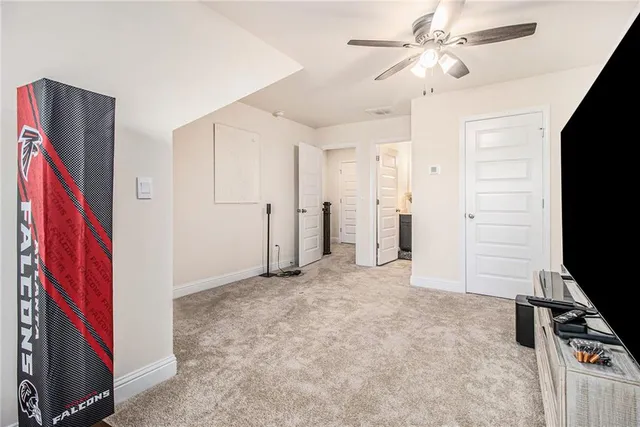 a view of a livingroom with a flat screen tv