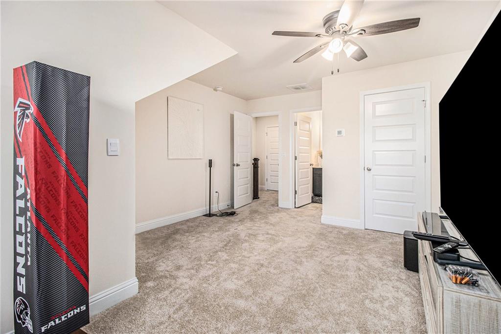 316 Conley Avenue Hampton, GA 30228 - Photo 21 of 27 a view of a livingroom with a flat screen tv