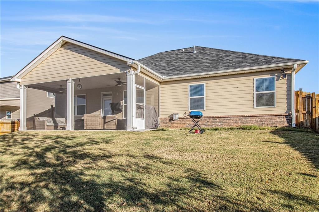 316 Conley Avenue Hampton, GA 30228 - Photo 25 of 27 a front view of a house with garden