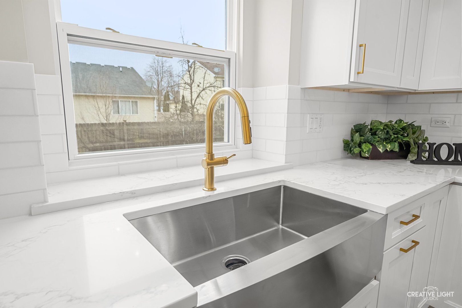 1472 Misty Lane Bolingbrook, IL 60490 - Photo 11 of 40 a kitchen with a sink and a window