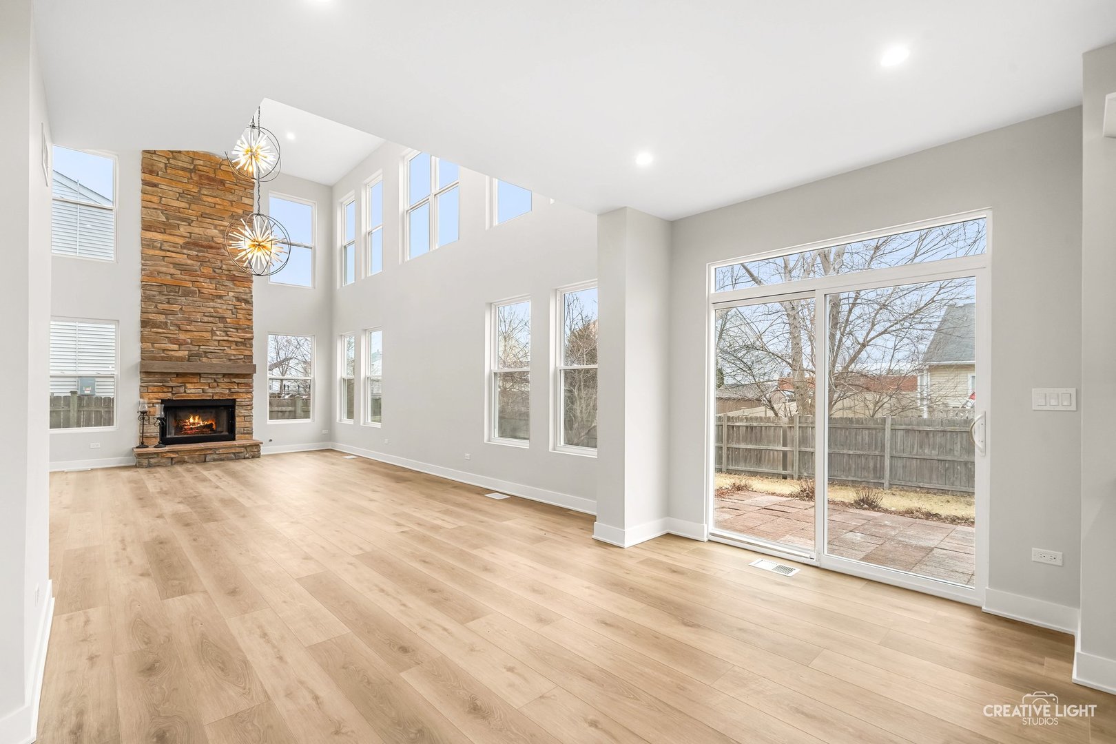 1472 Misty Lane Bolingbrook, IL 60490 - Photo 15 of 40 a view of an empty room with fireplace and a window