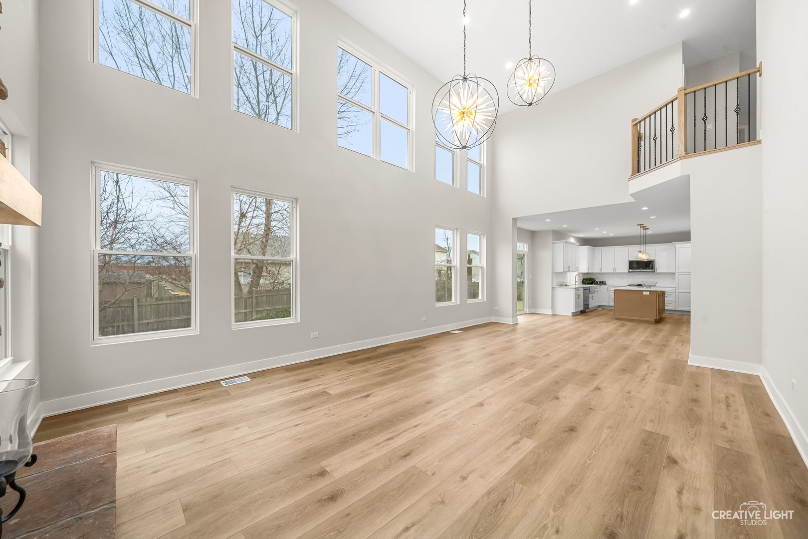1472 Misty Lane Bolingbrook, IL 60490 - Photo 16 of 40 a view of empty room with wooden floor and windows
