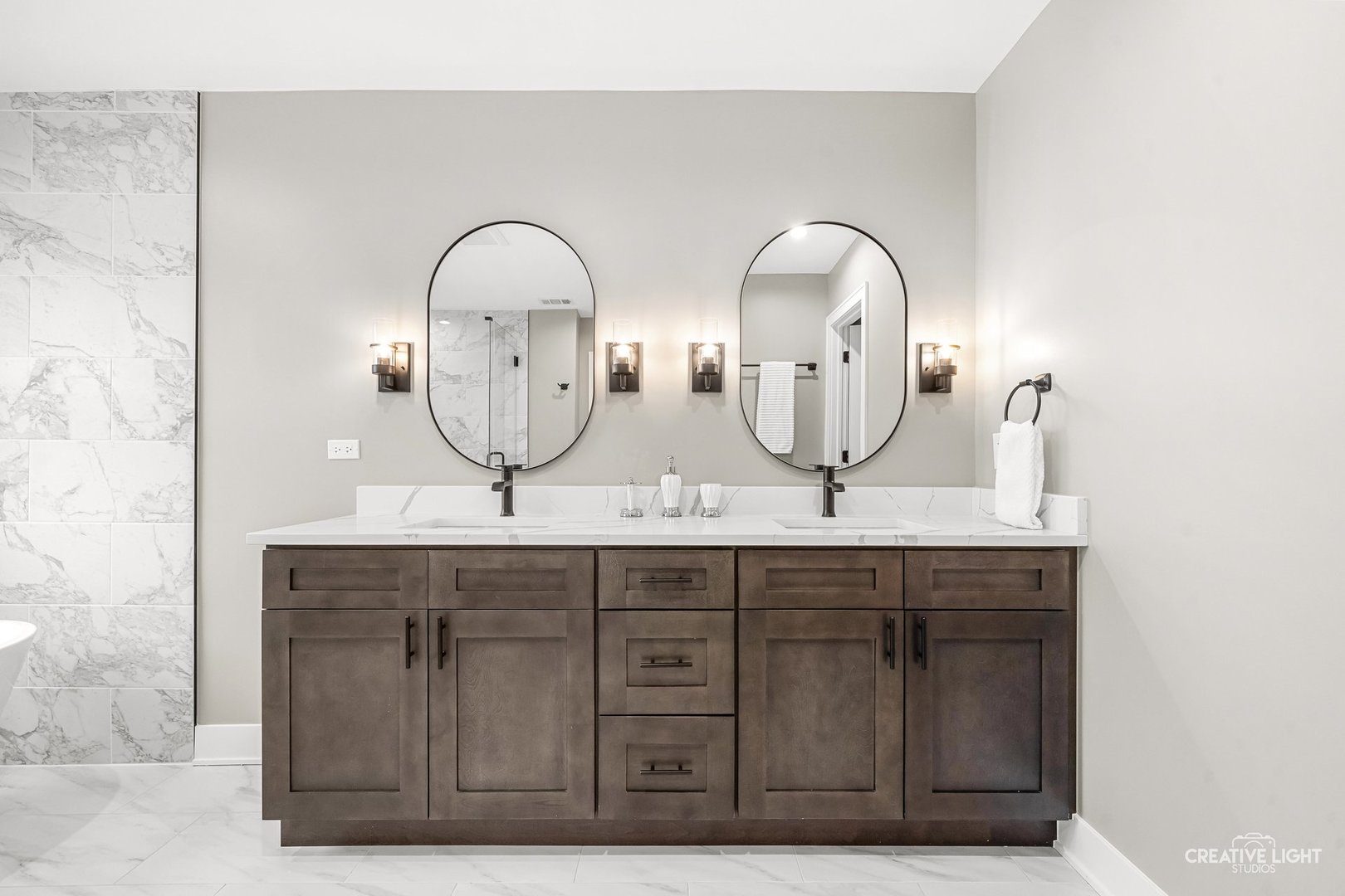 1472 Misty Lane Bolingbrook, IL 60490 - Photo 24 of 40 a bathroom with double sink and a mirror