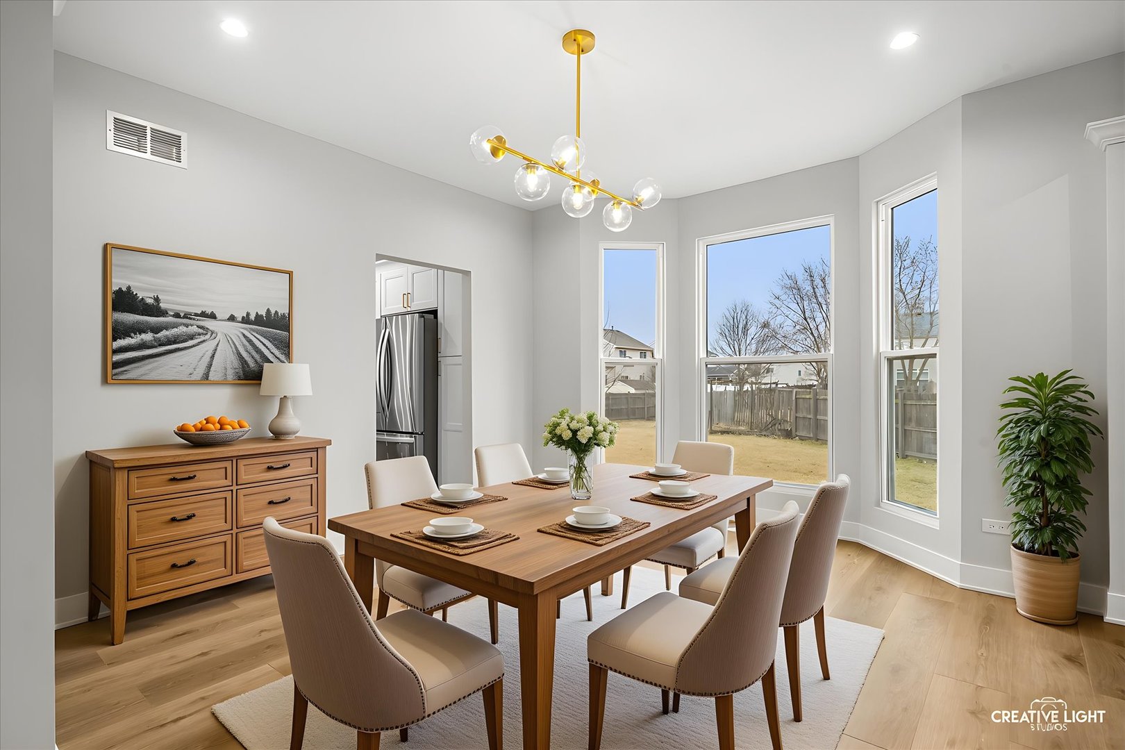 1472 Misty Lane Bolingbrook, IL 60490 - Photo 6 of 40 a view of a dining room with furniture window and wooden floor