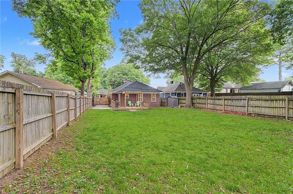 827 Elbert Street Southwest Atlanta, GA 30310 - Photo 28 of 33 a view of a house with backyard and sitting area