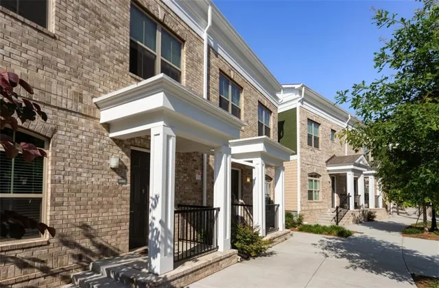 a view of a building with brick walls