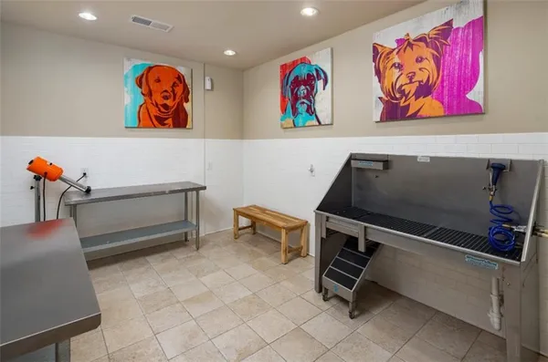 a room with toys and wall painting