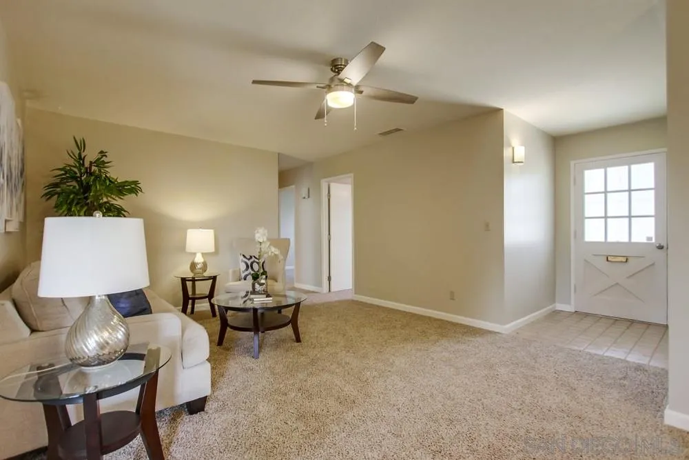 14533 Springvale Street Poway, CA 92064 - Photo 5 of 25 a living room with furniture and white walls