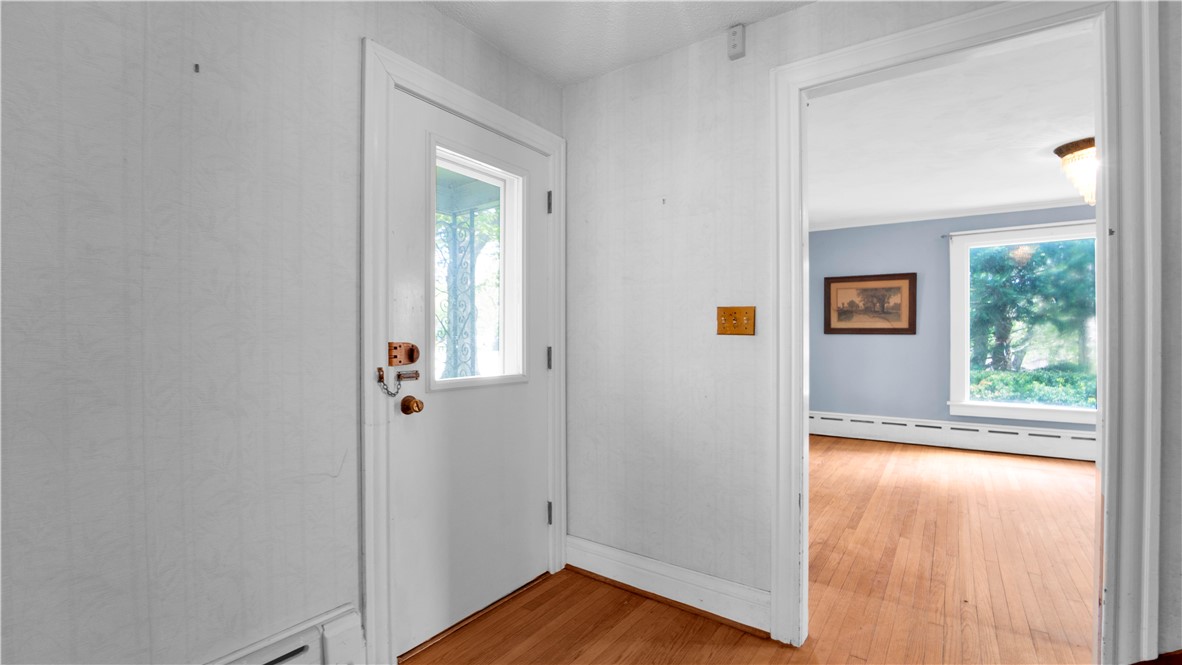 150 William Kidder Road Lancaster, NY 14086 - Photo 5 of 39 The 6' x 8' Entry, featuring original wood floors,