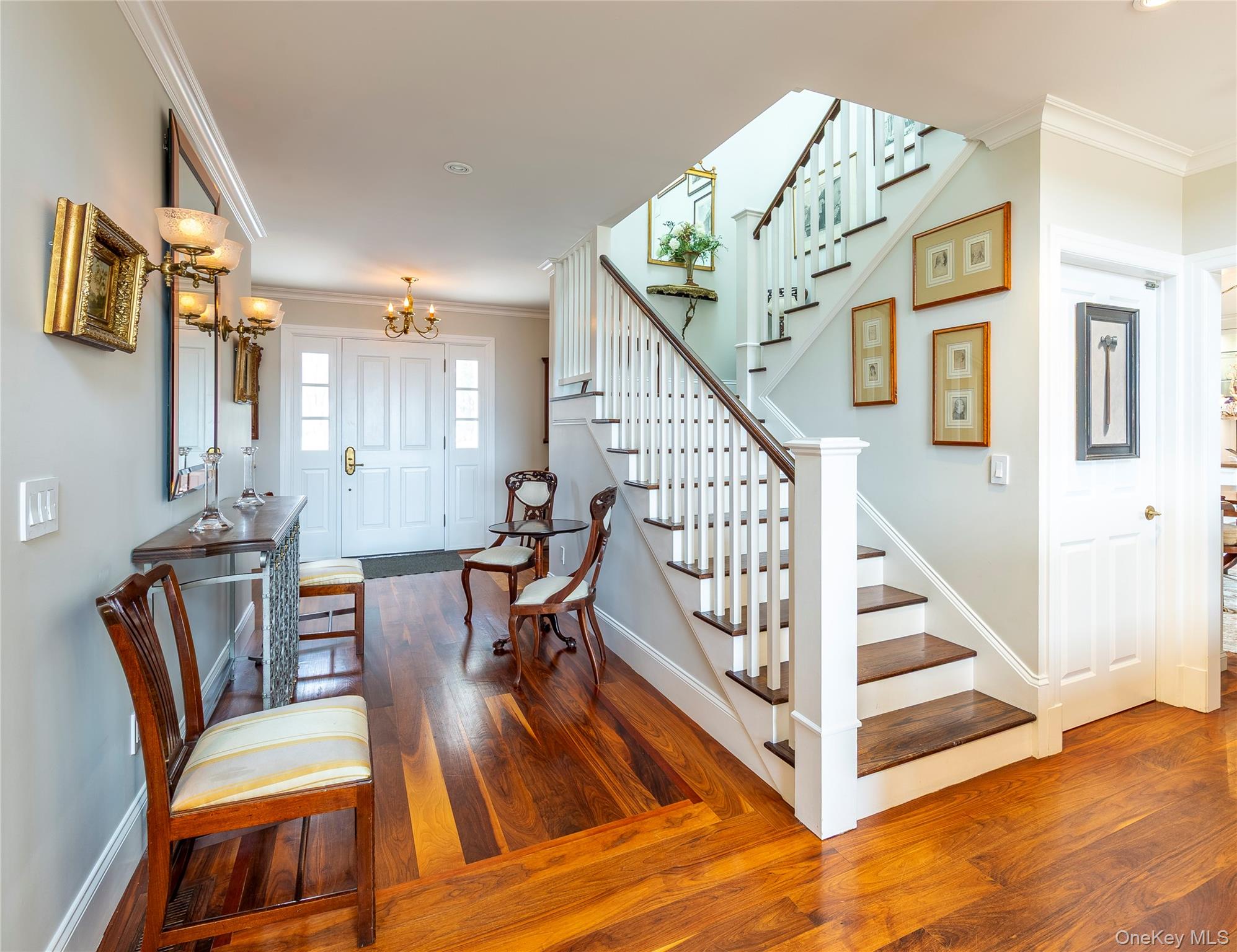 34 Meeting House Road Pawling, NY 12564 - Photo 18 of 44 a view of a livingroom with furniture stairs and windows
