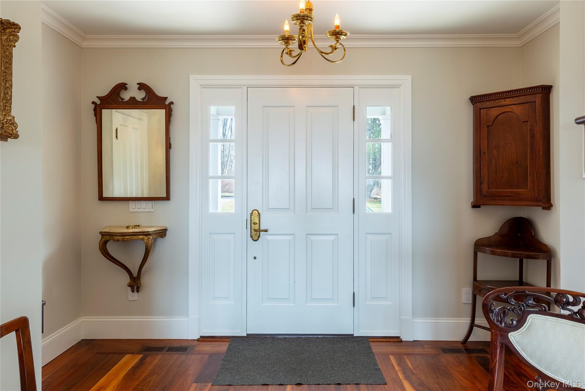 34 Meeting House Road Pawling, NY 12564 - Photo 3 of 44 a view of hallway with a mirror and wooden floor