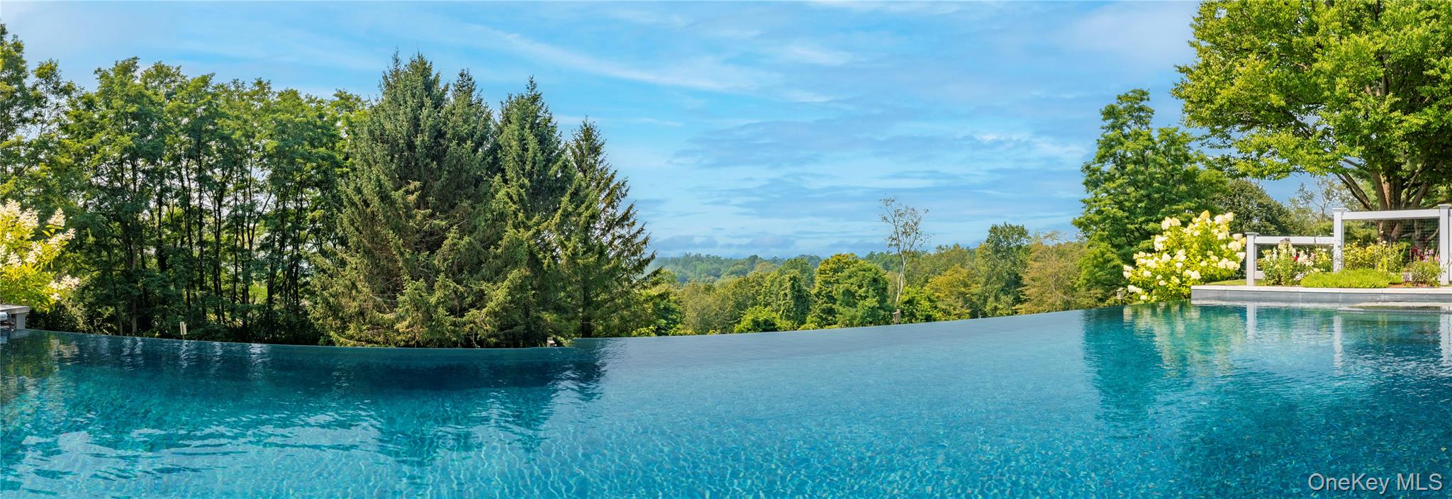 34 Meeting House Road Pawling, NY 12564 - Photo 34 of 44 a view of a lake view with a garden