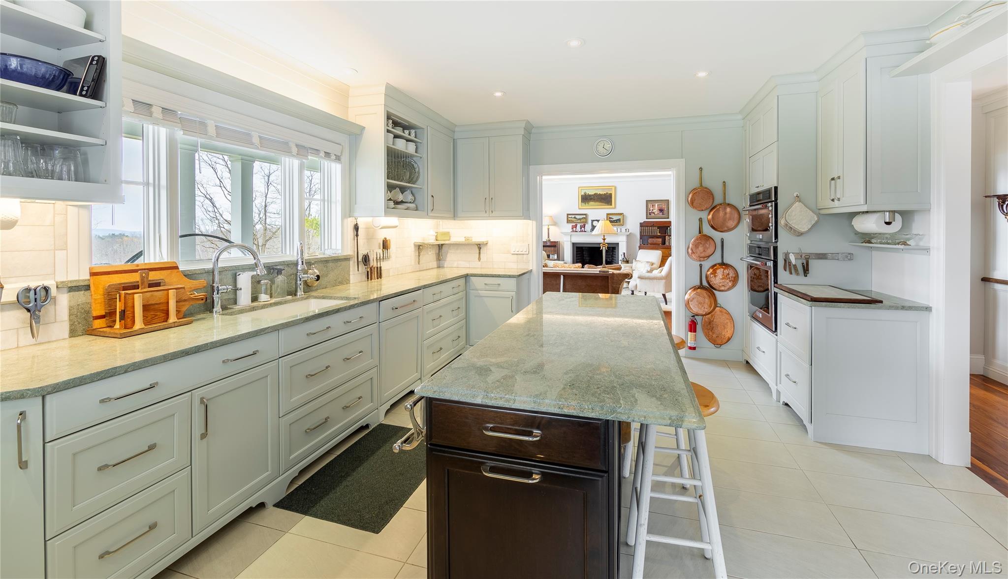 34 Meeting House Road Pawling, NY 12564 - Photo 7 of 44 a kitchen with white cabinets and sink