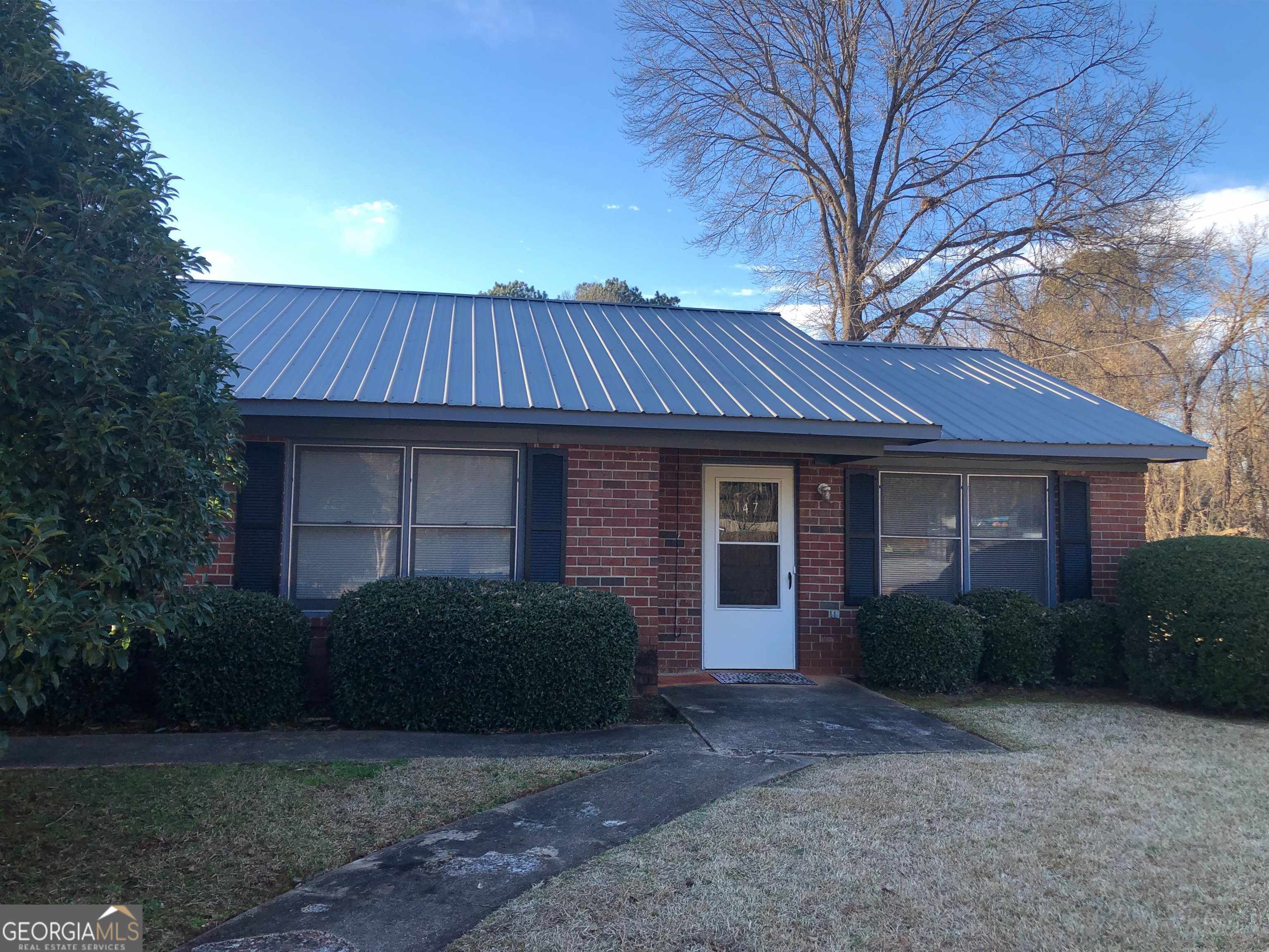 147 Dement Street Athens, GA 30605 - Photo 1 of 1 a front view of a house with garden