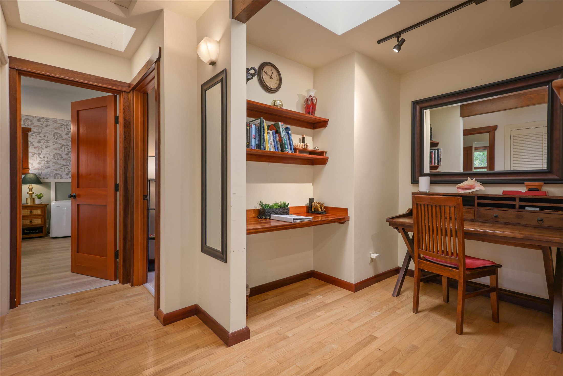 82-6289 Kahauloa Road Captain Cook, HI 96704 - Photo 11 of 29 a kitchen with stainless steel appliances granite countertop a refrigerator and a stove top oven